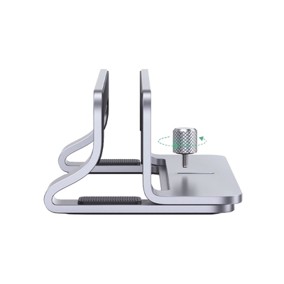 Soporte Vertical para Laptop / Adecuado para escritorio / Anchura Ajustable (12-26mm) / Amplia compatibilidad / Anti-Arañazos / Anti-Deslizante /Ajustable Mediante Tornillos / Color Plata / Aluminio + Silicona