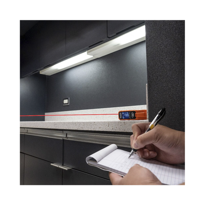 Medidor Compacto Láser de Distancias. Rango: 5.1 cm a 30.5 m / Opción cm o pulg. o Combinado /  Clip para Bolsillo.